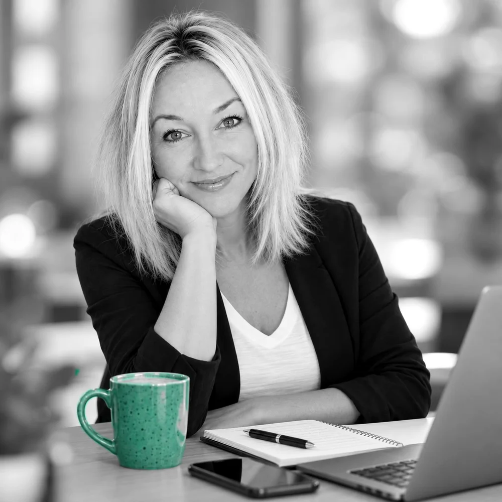 Nikki Wilson, founder of Solas Creative, at her desk ready for a free marketing consultation